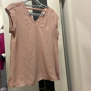 Blush blouse with detailing along neckline. DR2 size S.